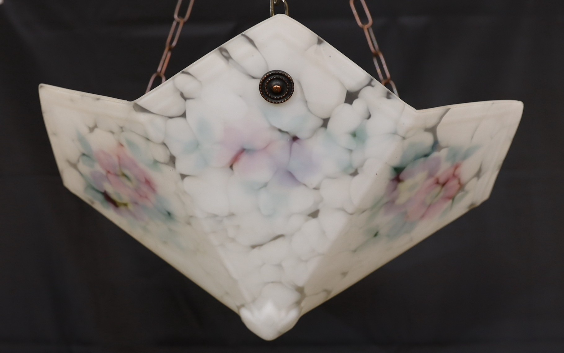 A 1930s hexagonal marbled glass light bowl with internal floral decoration, width 46cm